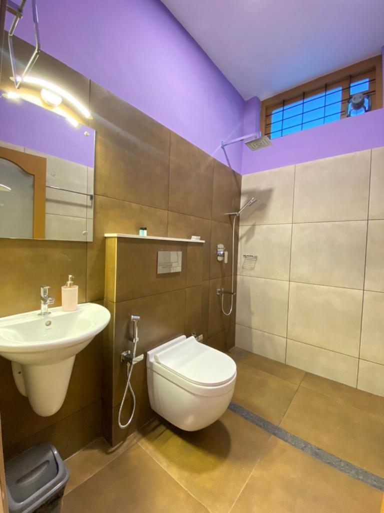 Munnar Blue Mist Bed & Breakfast Rom bilde